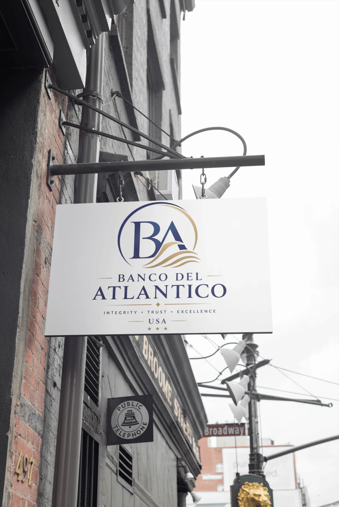 Banco Del Atlantico hanging sign on a brick building facade